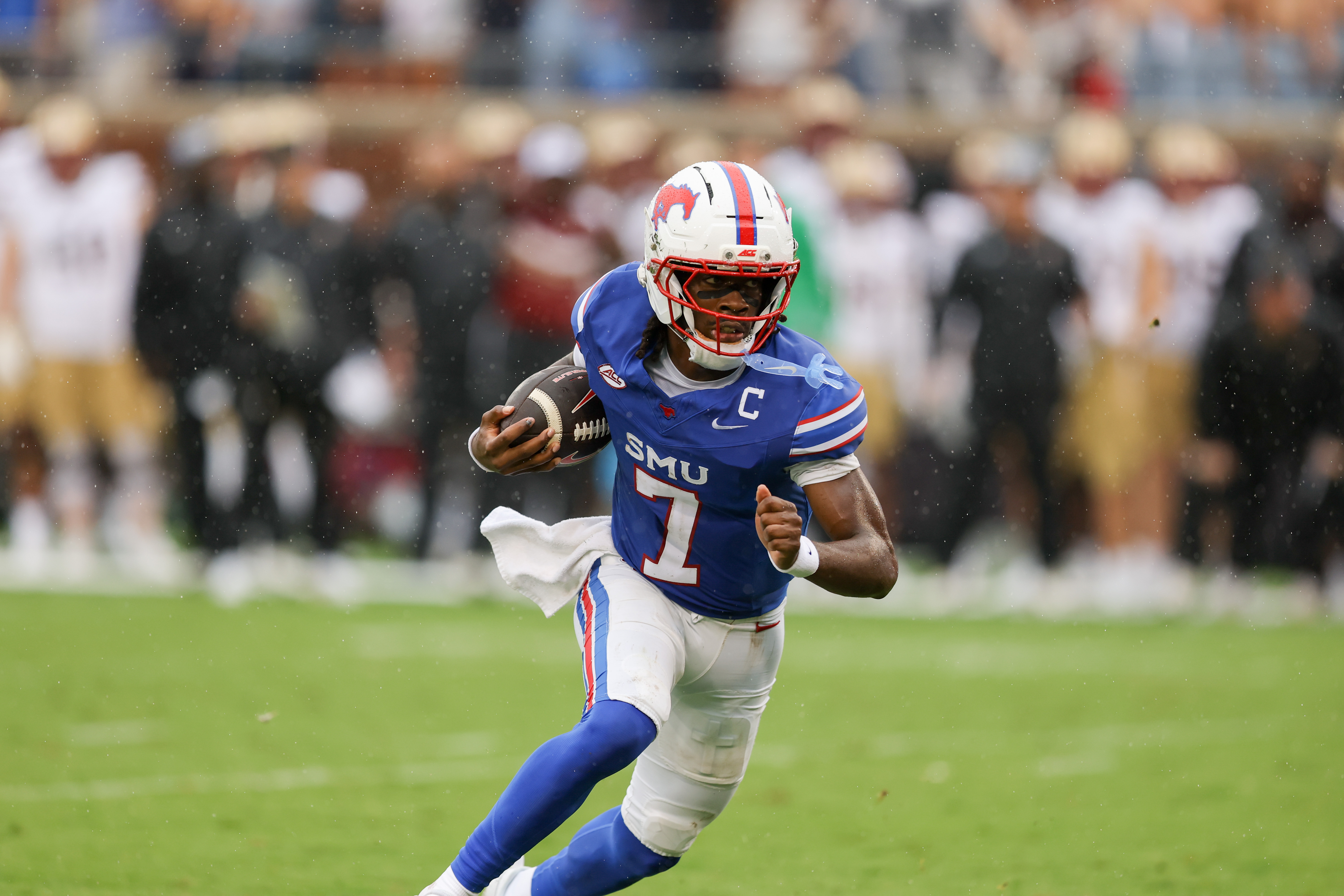 SMU quarterback Kevin Jennings rushes for a touchdown during an NCAA college football game against Boston College, Saturday, Oct. 3, 2026, in Dallas. 