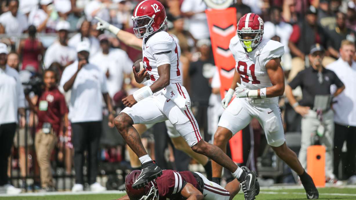 Alabama quarterback Keelon Russell (12) runs for a touchdown against Mississippi State during the first half of an NCAA college football game in Starkville, Miss., Saturday, Oct. 3, 2026.