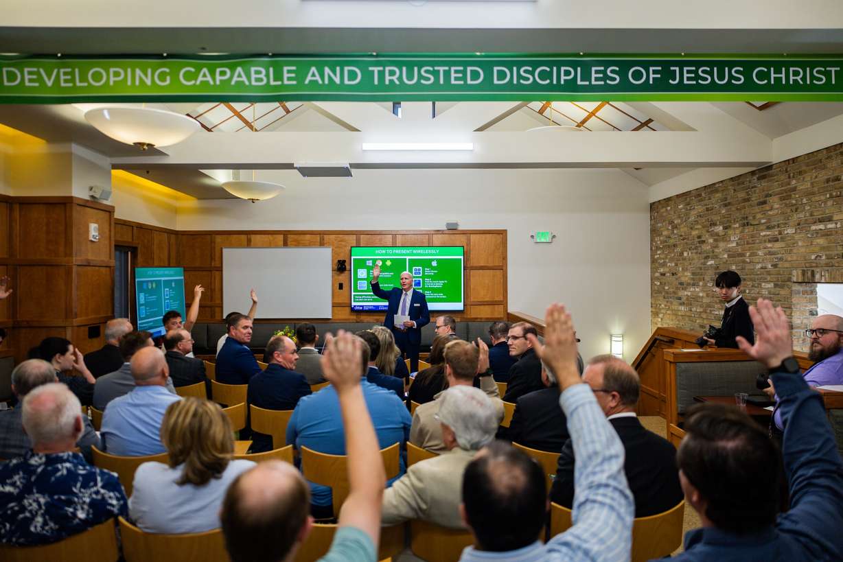 Tim Sloan, vice president of academics at Ensign College, asks students who are a part of the electrical program to raise their hands at an Ensign College open house celebrating the opening of its new electrical training program at the Vocational Technical Center in Salt Lake City on Friday.