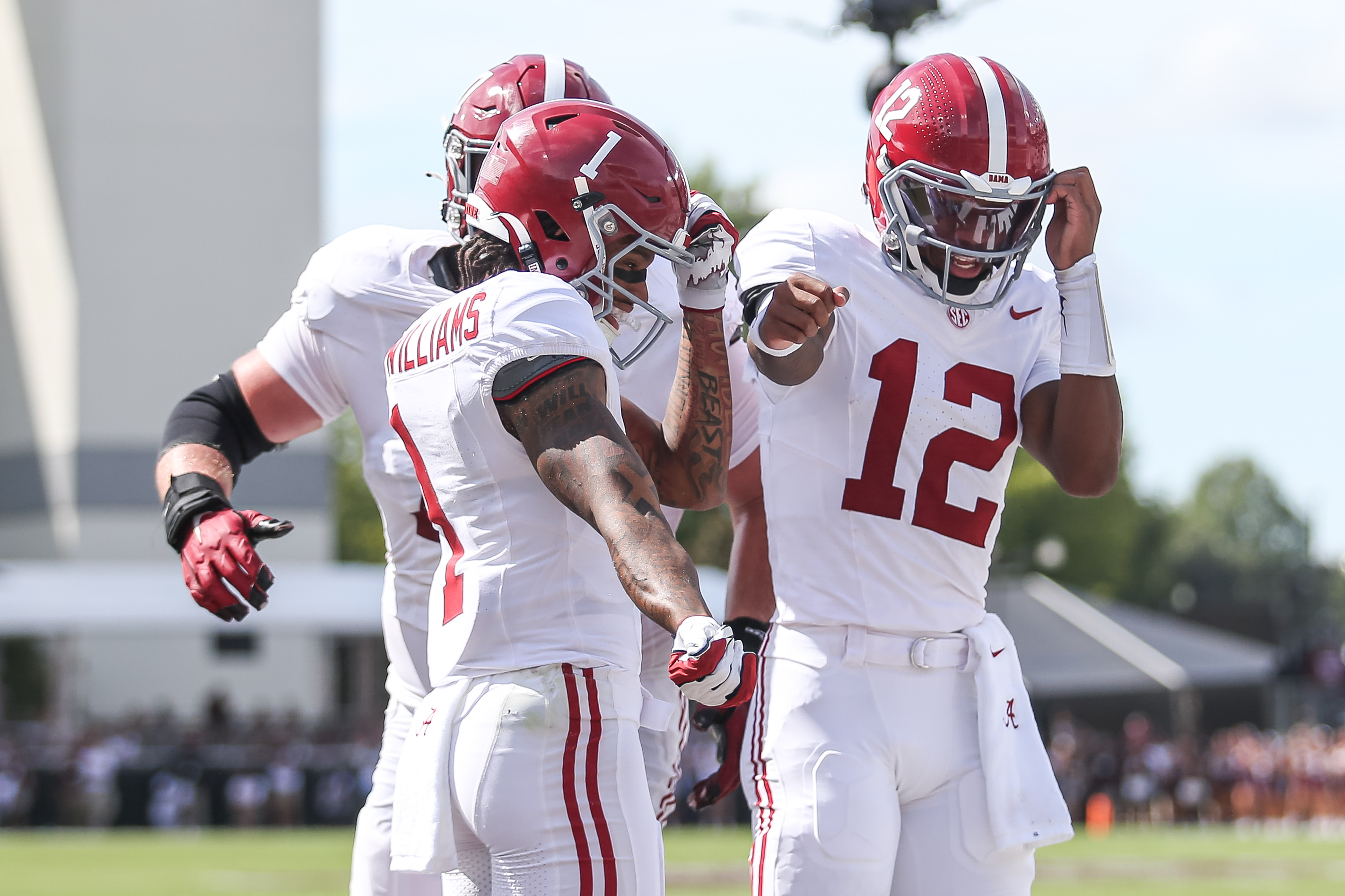 Alabama wide receiver Ryan Coleman-Williams (1) reacts to his touchdown with Alabama quarterback Keelon Russell (12) against Mississippi State during the first half of an NCAA college football game in Starkville, Miss., Saturday, Oct. 3, 2026. 