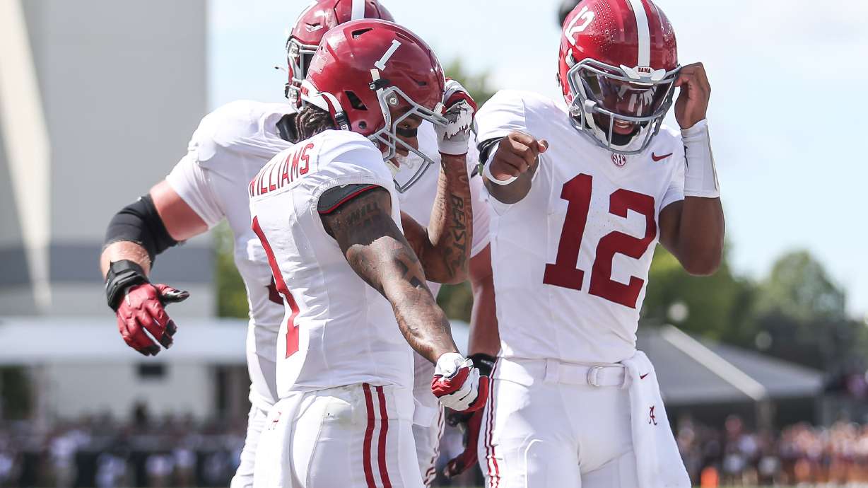 Alabama wide receiver Ryan Coleman-Williams (1) reacts to his touchdown with Alabama quarterback Keelon Russell (12) against Mississippi State during the first half of an NCAA college football game in Starkville, Miss., Saturday, Oct. 3, 2026.