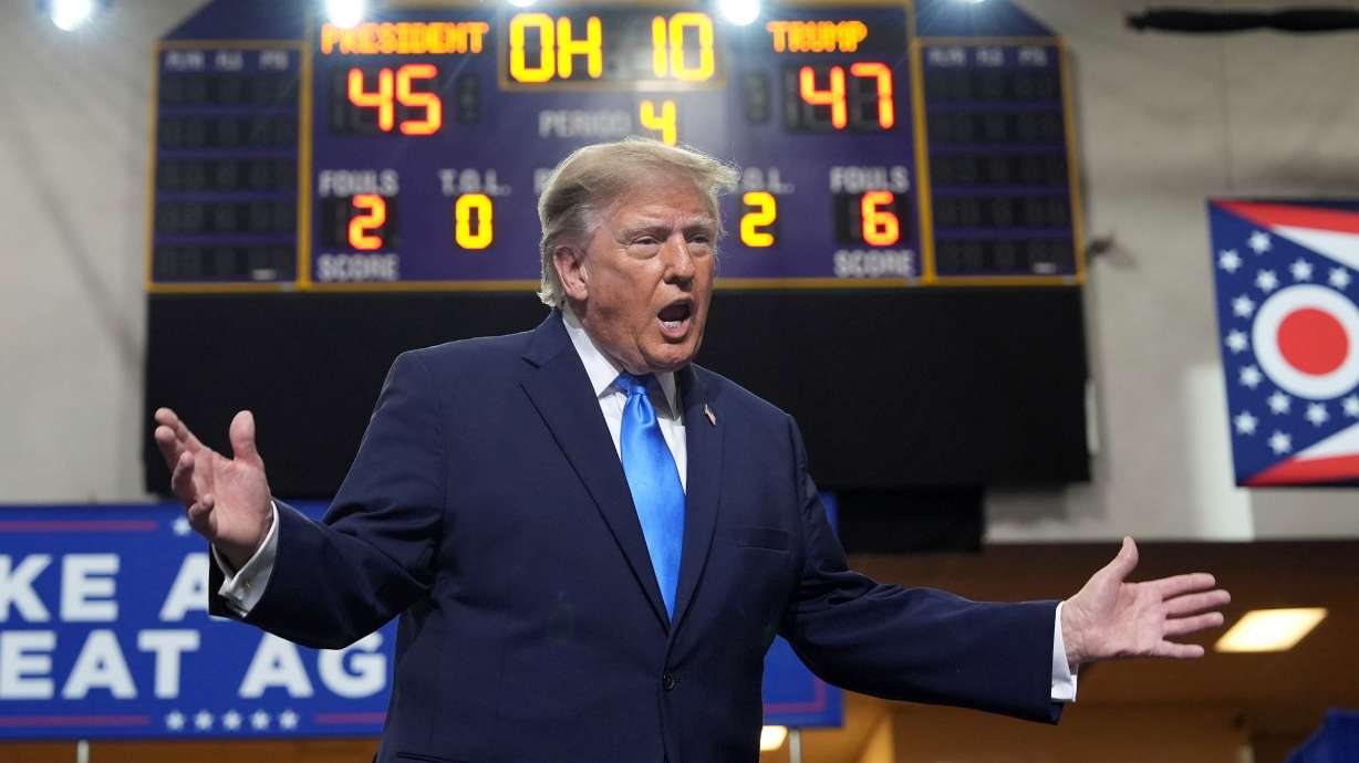 President Donald Trump speaks during an event at Butler High School in Vandalia, Ohio, Saturday. Trump struck a combative tone at the rally.