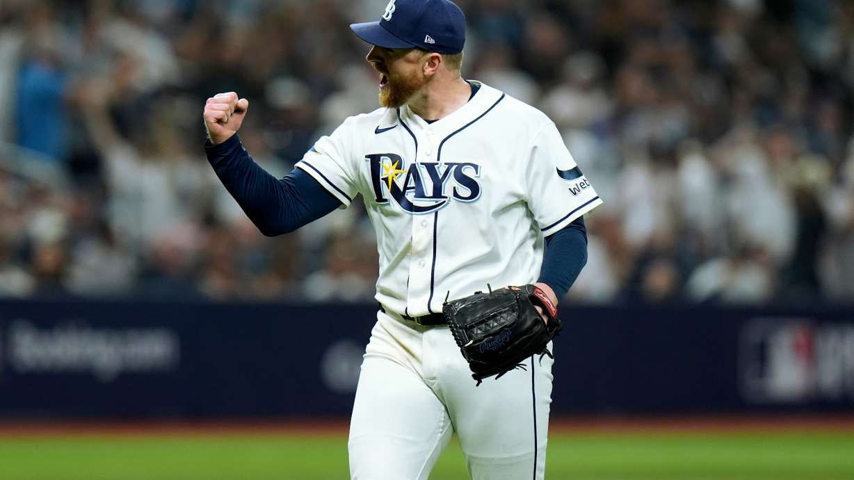Tampa Bay Rays pitcher Drew Rasmussen celebrates after striking out New York Yankees' Cody Bellinger to end the top of the sixth inning of Game 1 of an American League Division Series baseball game Saturday, Oct. 3, 2026, in St. Petersburg, Fla.