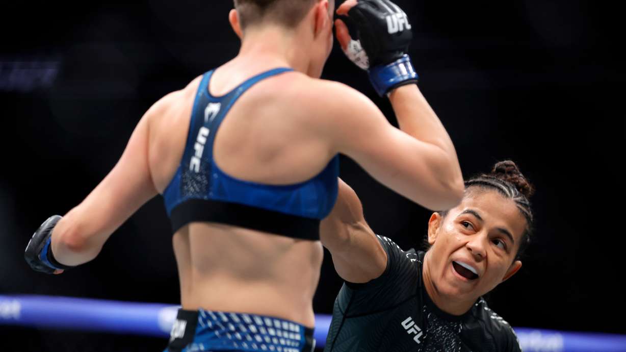 FILE - Natalia Silva, right, punches Rose Namajunas in a women's flyweight bout during the UFC 324 mixed martial arts event Saturday Jan. 24, 2026, in Las Vegas.