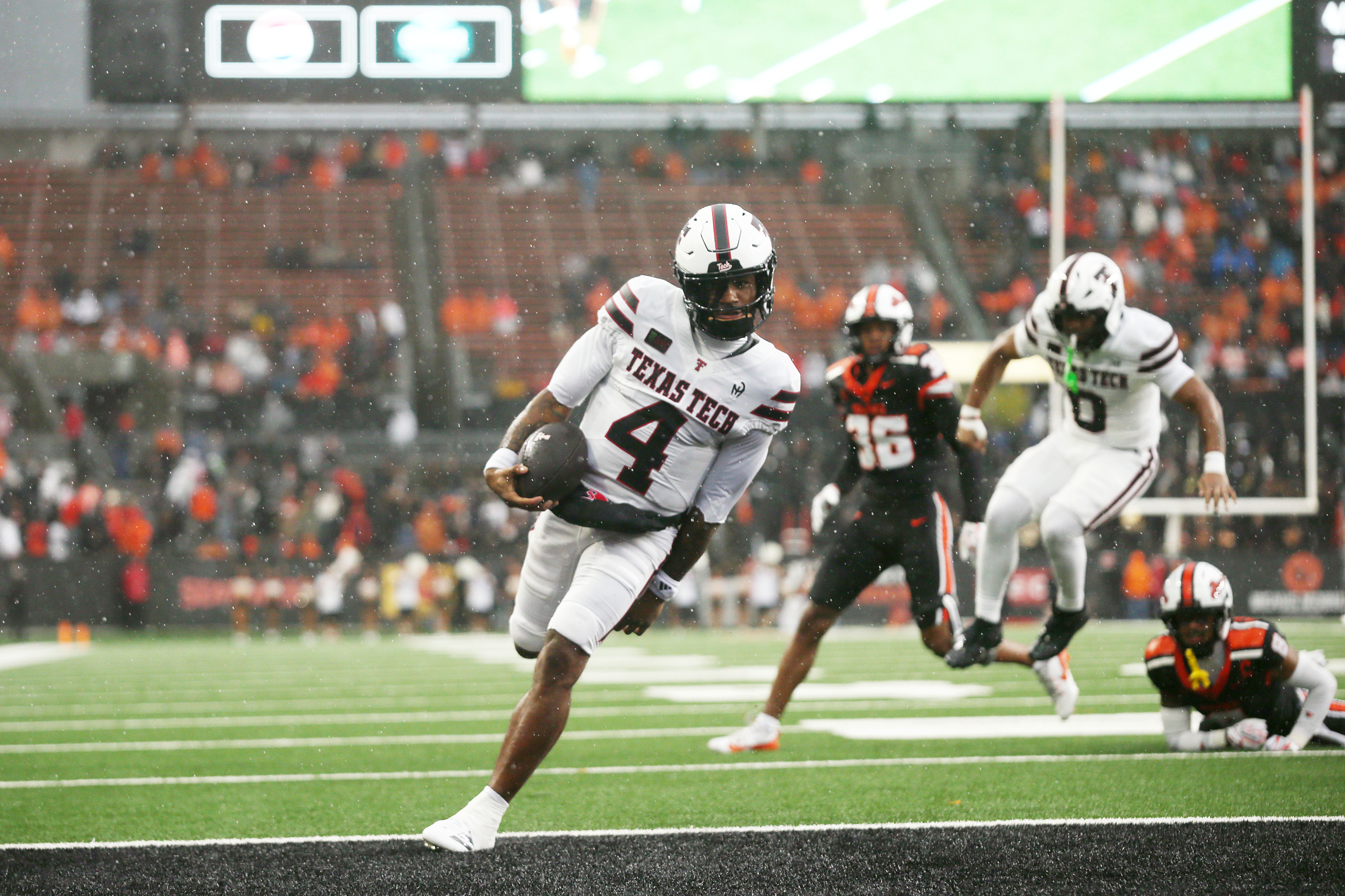 Texas Tech quarterback Tommy Castellanos (4) runs into the end zone for a touchdown during the first half of an NCAA college football game against Oregon State, Saturday, Sept. 12, 2026, in Corvallis, Ore. 