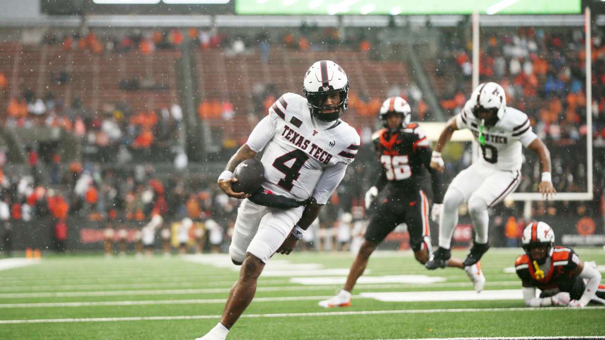 Texas Tech quarterback Tommy Castellanos (4) runs into the end zone for a touchdown during the first half of an NCAA college football game against Oregon State, Saturday, Sept. 12, 2026, in Corvallis, Ore.