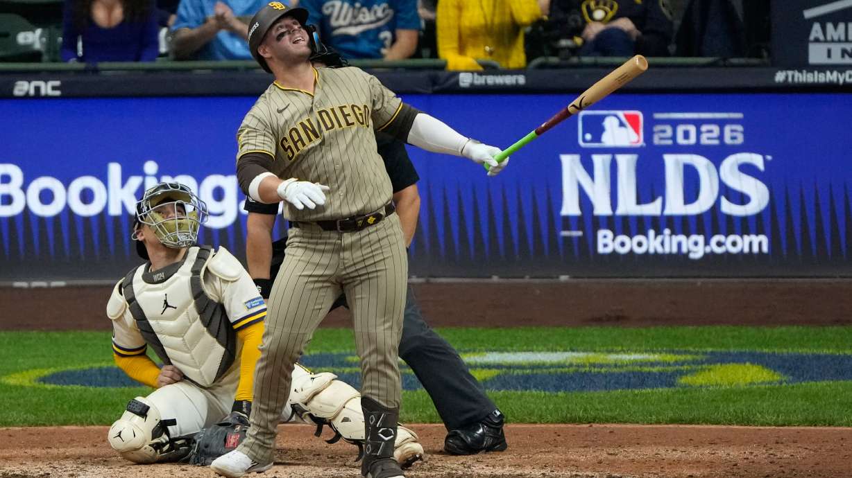 San Diego Padres' Ty France watches his ball hit a cable near the roof of American Family Field during the ninth inning of Game 1 of a National League Divisional baseball playoff series Sunday, Oct. 4, 2026, in Milwaukee.