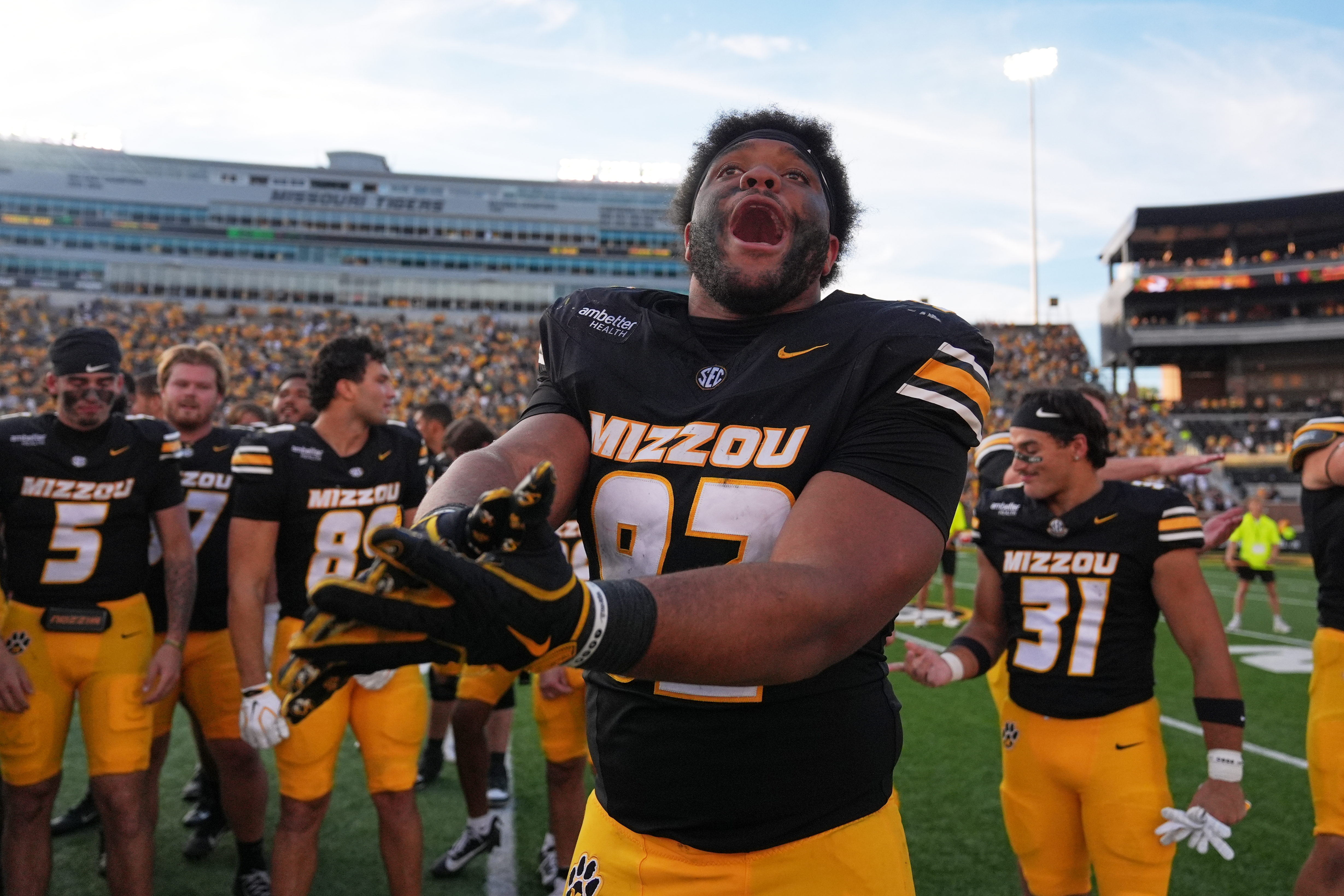 Missouri defensive tackle Jason Dowell celebrates a victory over Florida with his teammates following an NCAA college football game Saturday, Oct. 3, 2026, in Columbia, Mo. 