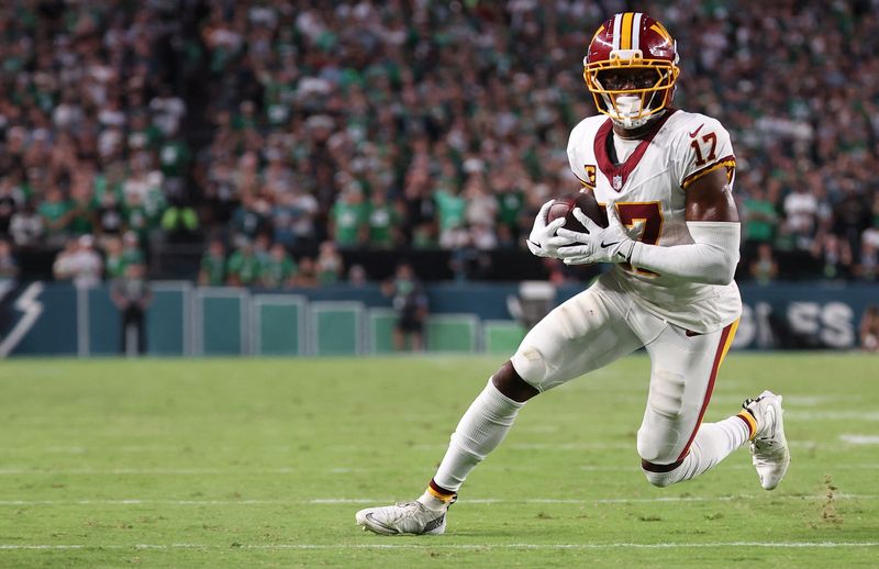 Sep 13, 2026; Philadelphia, Pennsylvania, USA;  Washington Commanders wide receiver Terry McLaurin (17) catches a pass for a first down against the Philadelphia Eagles during the second half at Lincoln Financial Field.