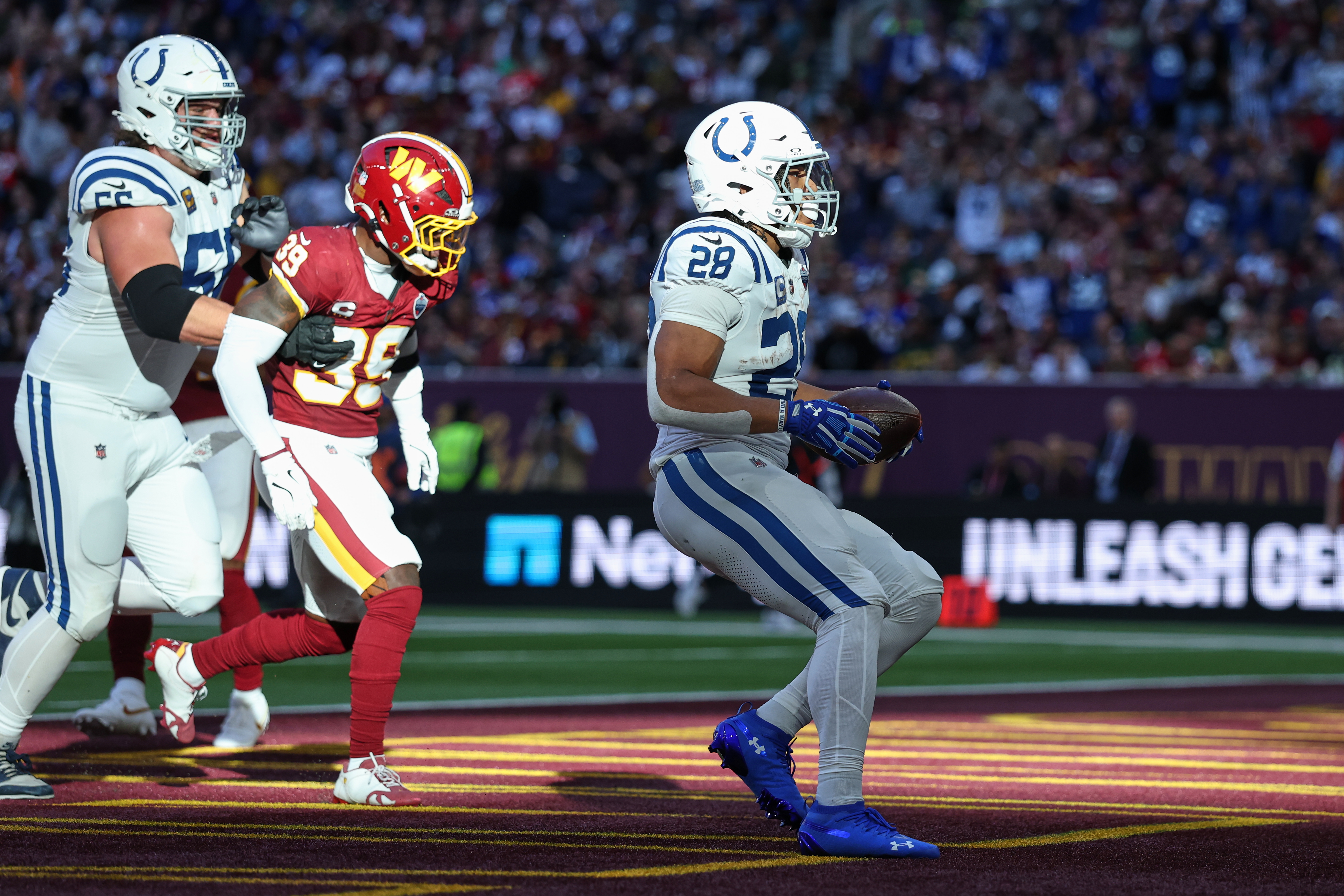 Indianapolis Colts running back Jonathan Taylor (28) celebrates after scoring his side's second touchdown during an NFL football game against Washington Commanders in London, Sunday, Oct. 4, 2026. 