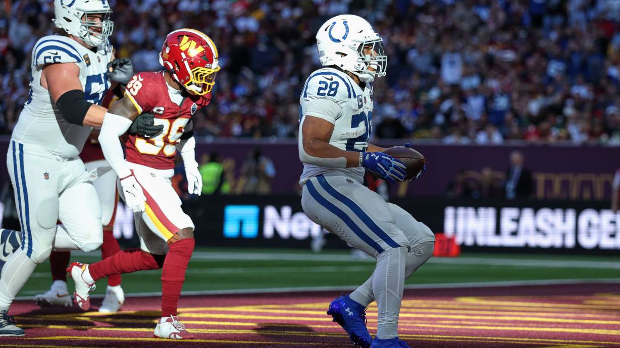 Indianapolis Colts running back Jonathan Taylor (28) celebrates after scoring his side's second touchdown during an NFL football game against Washington Commanders in London, Sunday, Oct. 4, 2026.