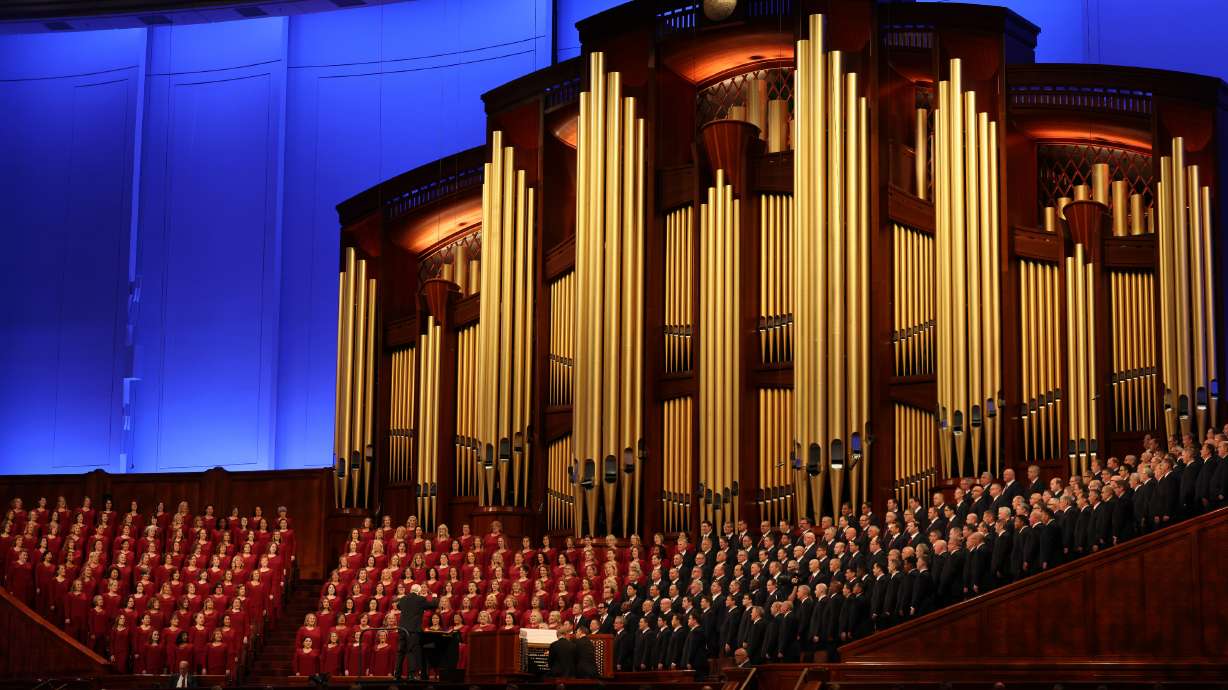 Members of the Tabernacle Choir at Temple Square sing under the direction of Mac Wilberg during the 196th Semiannual General Conference of The Church of Jesus Christ of Latter-day Saints in Salt Lake City on Sunday morning.