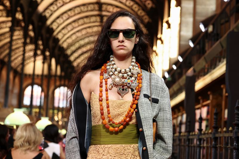Valentino unveils corset tops and chunky jewellery at fashion show in 19th-century Paris library