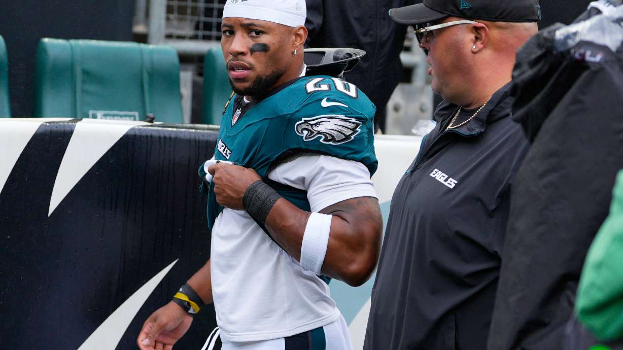 Philadelphia Eagles running back Saquon Barkley walks to the locker room after an injury during the first half of an NFL football game against the Los Angeles Rams in Philadelphia, Sunday, Oct. 4, 2026.