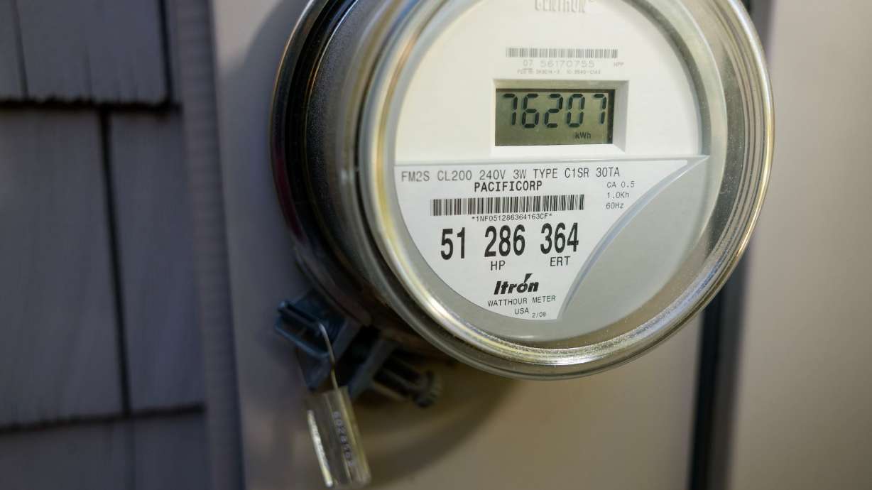A home’s energy usage is tracked on a meter socket in Salt Lake City on Sept. 30.