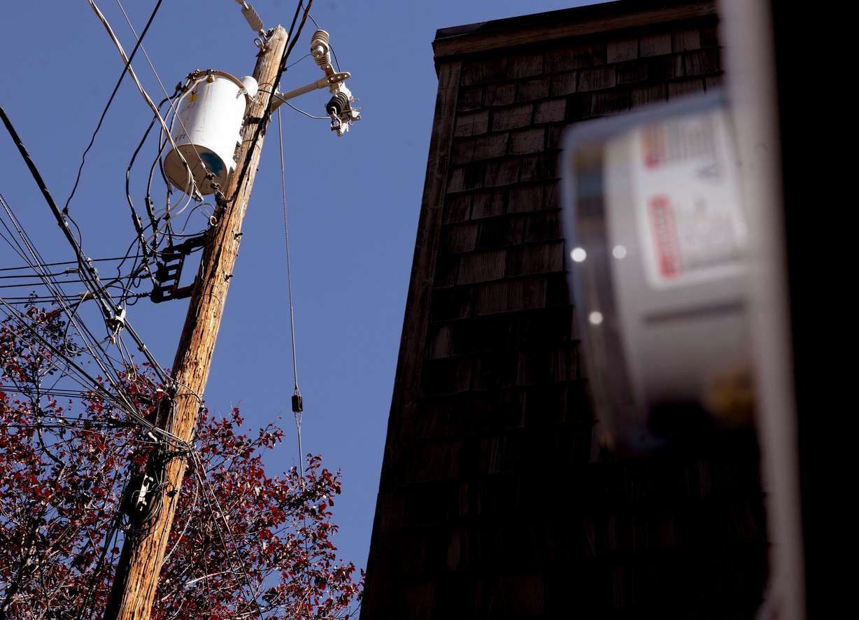 A home’s energy usage is tracked on a meter socket in Salt Lake City on Sept. 30.