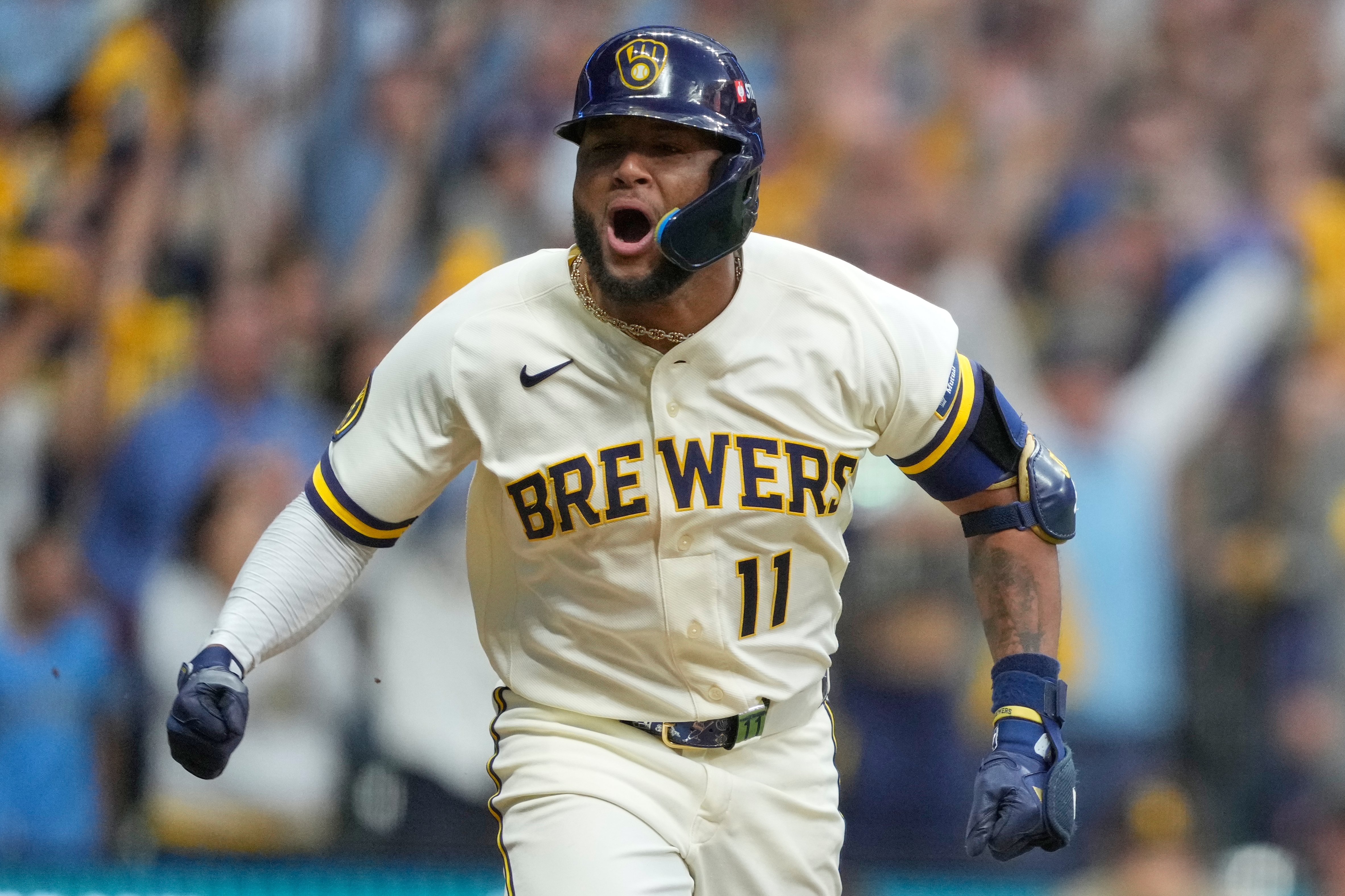 Milwaukee Brewers' Jackson Chourio celebrates after hitting a walkoff hit during the ninth inning of Game 2 of a National League Divisional baseball playoff series against the San Diego Padres Sunday, Oct. 4, 2026, in Milwaukee. 