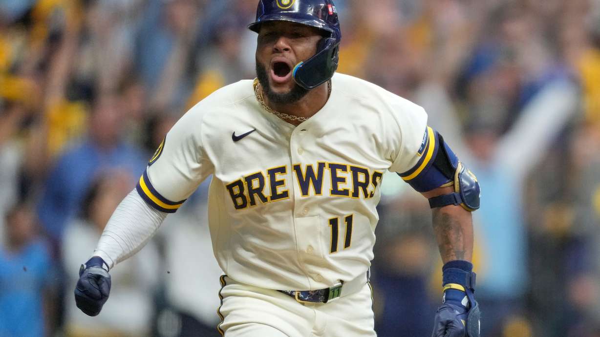 Milwaukee Brewers' Jackson Chourio celebrates after hitting a walkoff hit during the ninth inning of Game 2 of a National League Divisional baseball playoff series against the San Diego Padres Sunday, Oct. 4, 2026, in Milwaukee.