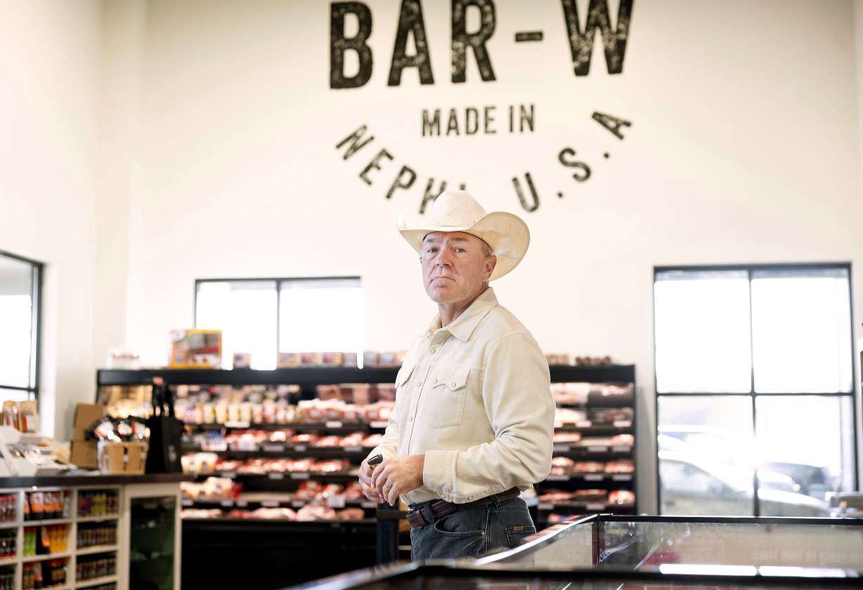 Korey Wright stands in the Bar-W Beef retail store in Nephi on Sept. 23.