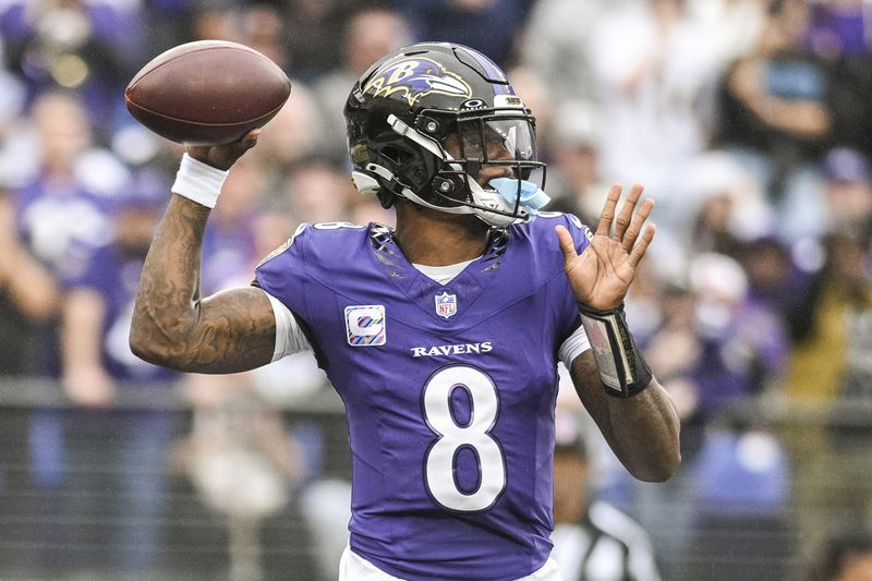 Oct 4, 2026; Baltimore, Maryland, USA;    Baltimore Ravens quarterback Lamar Jackson (8) drops back to pass during the first half against the Tennessee Titans at M&amp;T Bank Stadium.