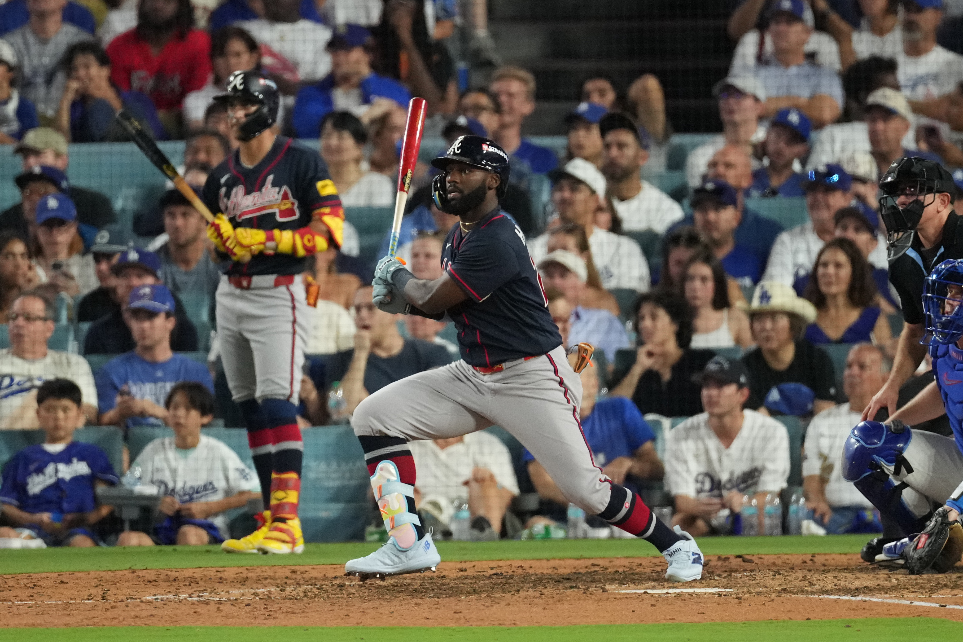 Atlanta Braves' Michael Harris II celebrates after hitting an RBI double during the seventh inning of Game 2 of a National League Division Series baseball game against the Los Angeles Dodgers Sunday, Oct. 4, 2026, in Los Angeles. 