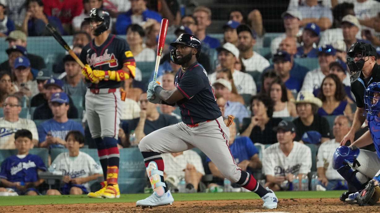 Atlanta Braves' Michael Harris II celebrates after hitting an RBI double during the seventh inning of Game 2 of a National League Division Series baseball game against the Los Angeles Dodgers Sunday, Oct. 4, 2026, in Los Angeles.