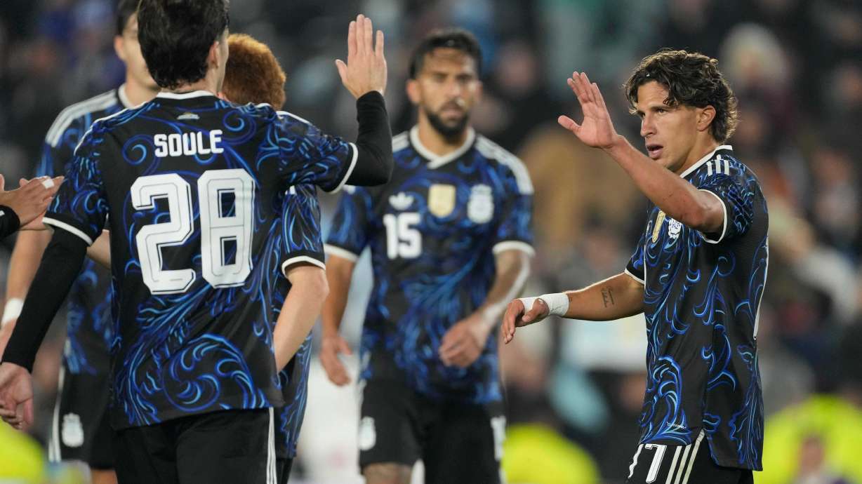 Argentina's Giuliano Simeone, right, celebrates with teammates after scoring his side's seventh goal against Burkina Faso during an international friendly soccer match in Buenos Aires, Argentina, Saturday, Oct. 3, 2026.