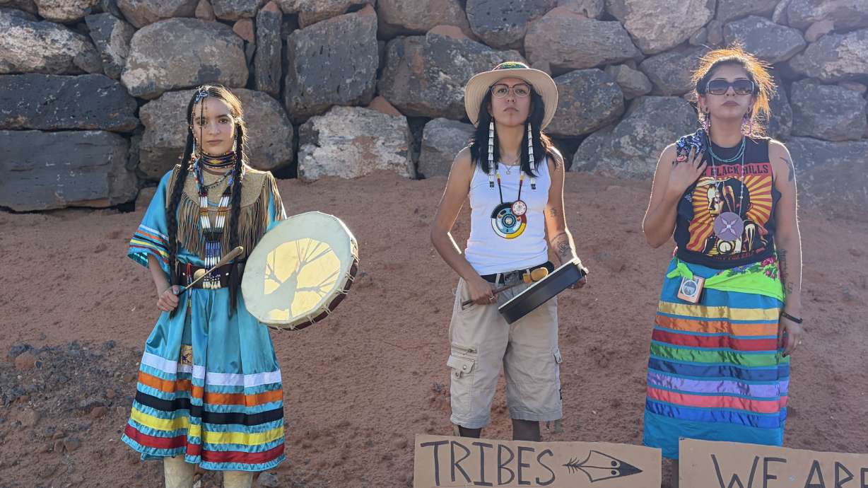Nearly 60 members and supporters of the Shivwits Band of Paiute Native American Tribe stood Saturday in protest of a golf resort projected to be built on tribal land — through a land lease agreement that many say they didn't agree to or know about.