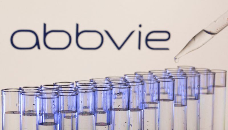 FILE PHOTO: Test tubes are seen in front of a displayed Abbvie logo in this illustration taken, May 21, 2021.