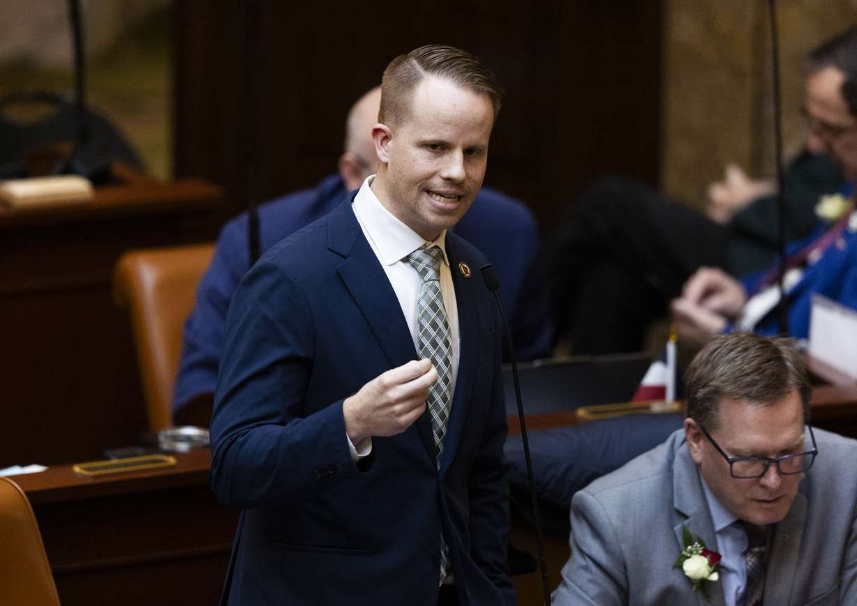 Then-Rep. Trevor Lee, R-Layton, speaks on the floor of the House of Representatives, in Salt Lake City on Feb. 21, 2025.