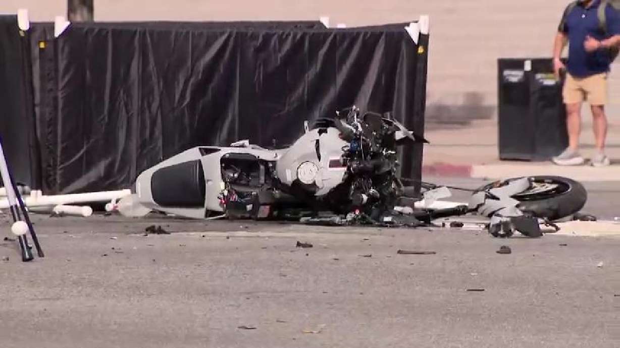 The wreckage of a fatal crash at the intersection of 400 South and West Temple is pictured on Monday. One person is dead after a crash involving a motorcycle and a car in Salt Lake City Monday afternoon.