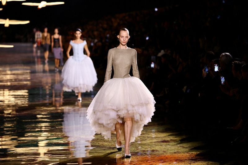 Models present creations by designer Matthieu Blazy as part of his Spring/Summer 2027 Women's ready-to-wear collection show for fashion house Chanel during Paris Fashion Week in Paris, France, October 5, 2026.