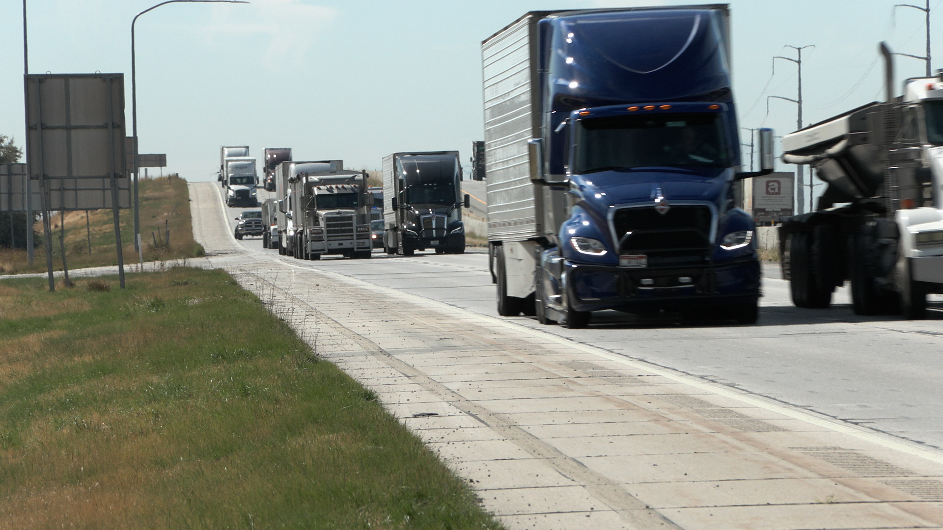 Semis drive north on I-15 near Brigham City, Monday.