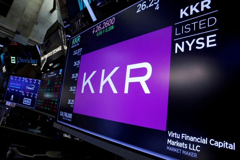 FILE PHOTO: Trading information for KKR & Co is displayed on a screen on the floor of the New York Stock Exchange (NYSE) in New York, U.S., August 23, 2018.