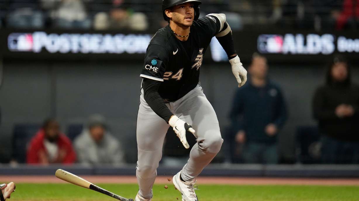 Chicago White Sox's Braden Montgomery (24) watches his 2-run double during the sixth inning of Game 2 of baseball's American League Division Series against the Cleveland Guardians, Monday, Oct. 5, 2026, in Cleveland.