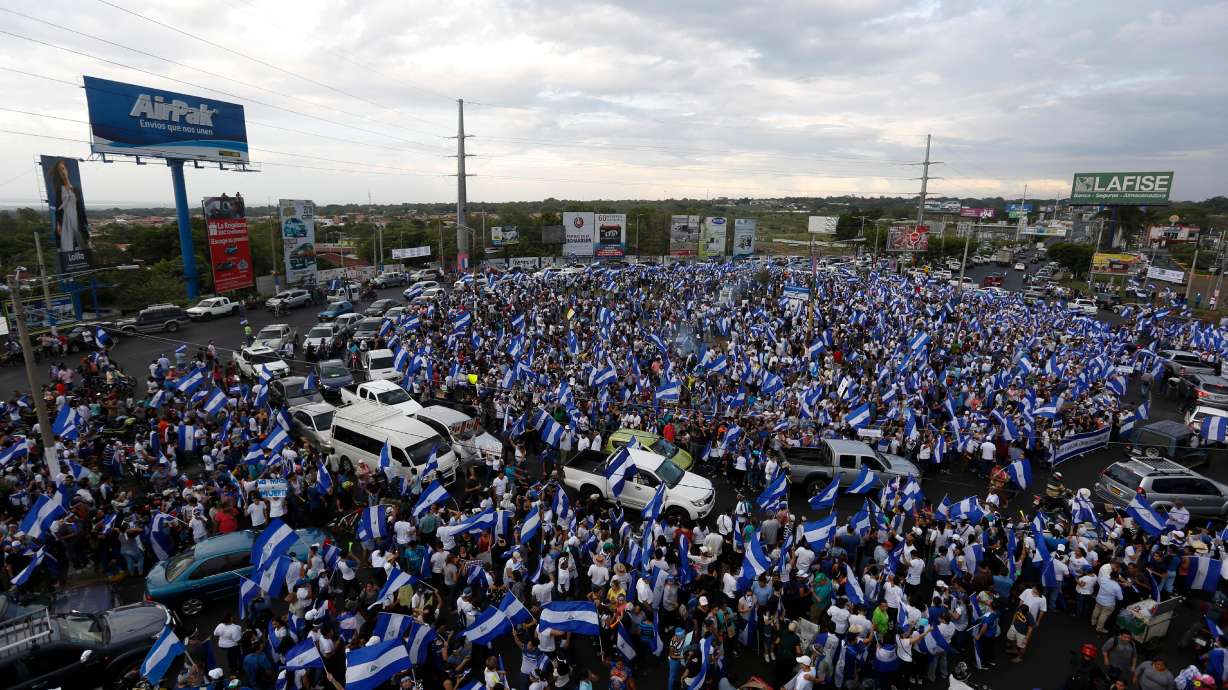 People protest at the Jean Paul Genie roundabout against the government of President Daniel Ortega, in Managua, Nicaragua, on May 15, 2018. A Nicaraguan exile who was imprisoned and tortured after protesting against the government was deported by the U.S. back to his country.