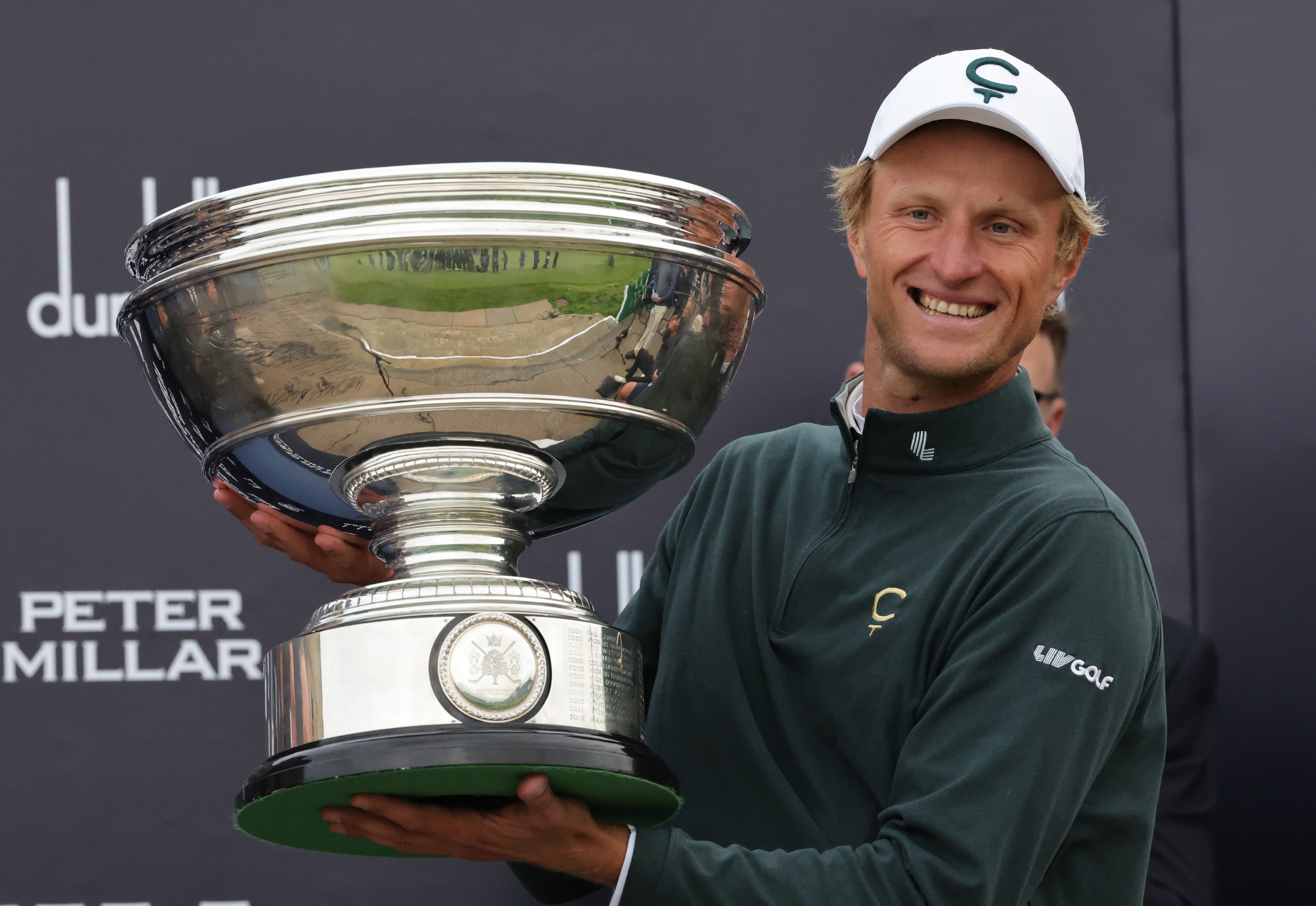Adrian Meronk of Poland holds the trophy after winning the Alfred Dunhill Links Championship 2026 at the Old Course at St Andrews, Scotland, Sunday Oct. 4, 2026. 