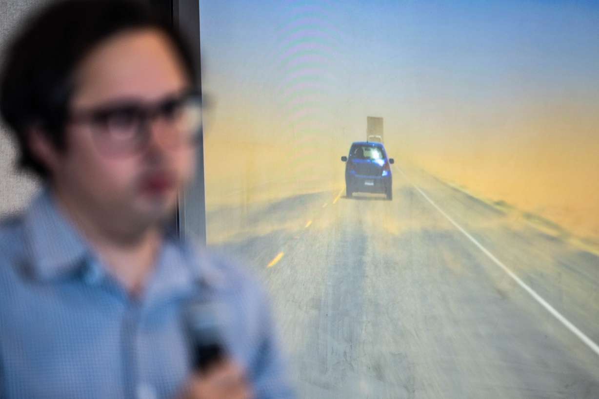 A dust-covered road is shown during a Solutions Series panel hosted by the Great Salt Lake Alliance at the Zions Bank Building in Salt Lake City on Monday.