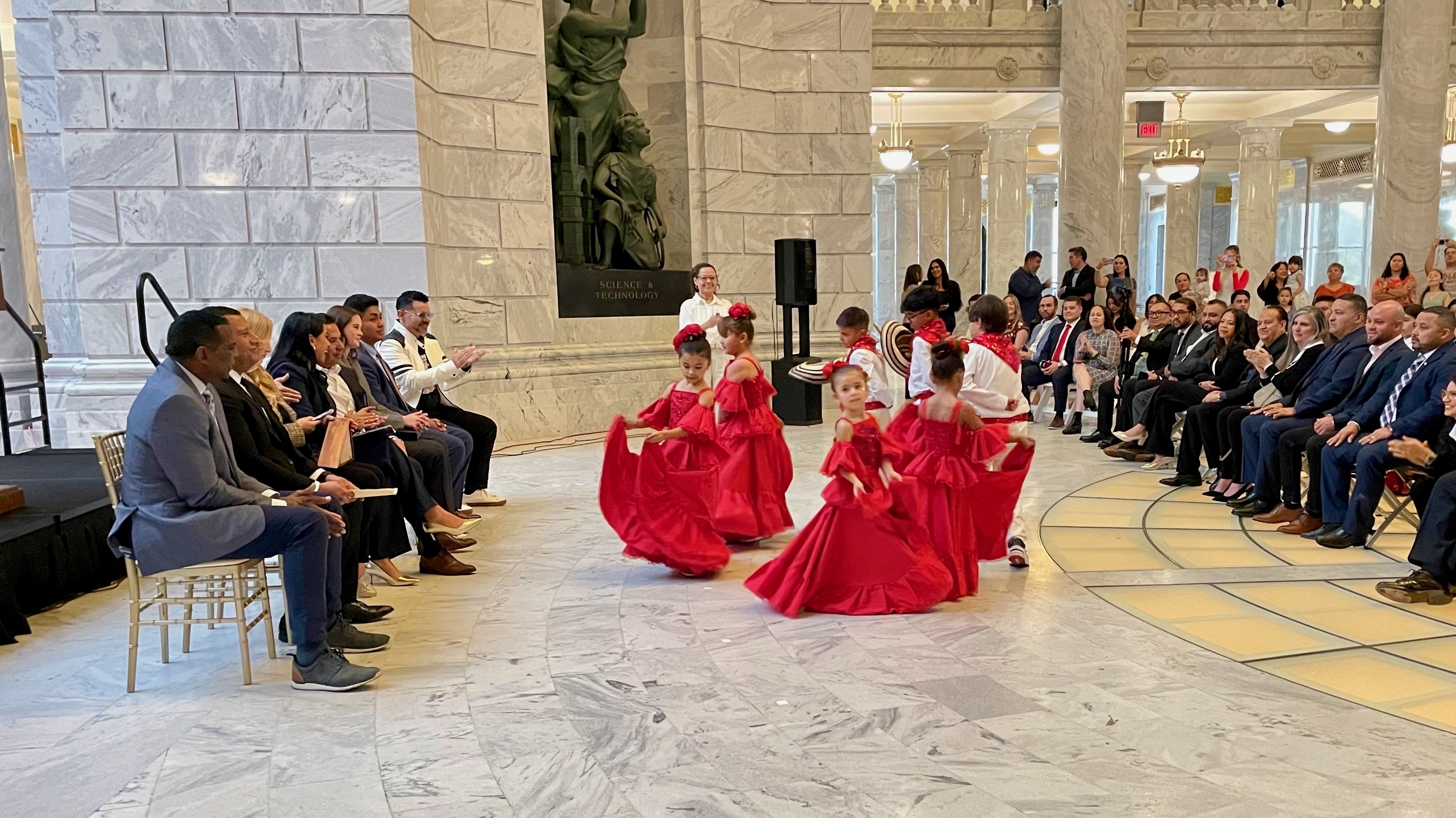 Speakers at a Hispanic Heritage Month event at the Utah Capitol in Salt Lake City on Monday, Oct. 5, 2026, variously lauded the "American way" and the opportunity they say have found in the United States. A folkloric dance is pictured performing at the event.