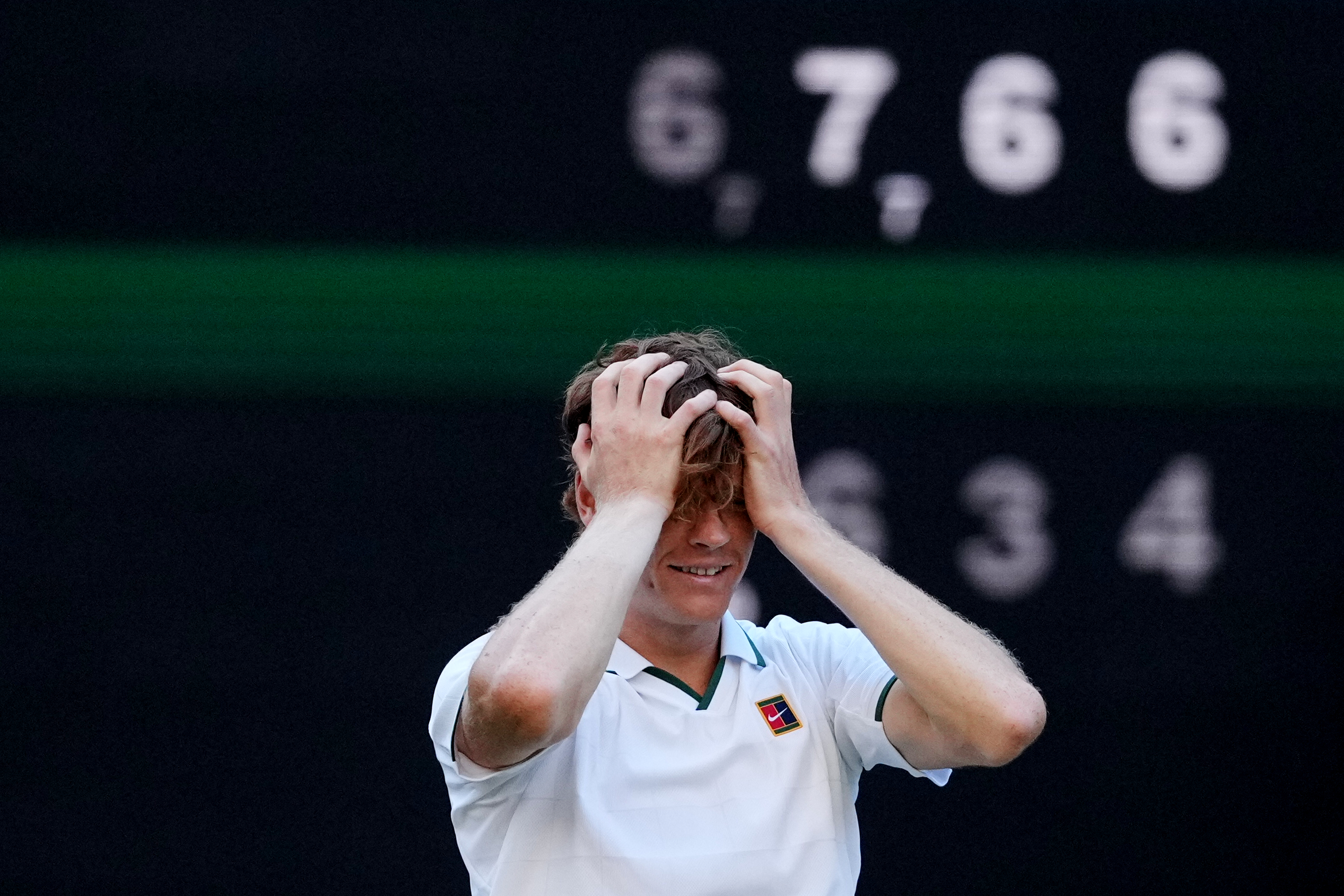 FILE - Jannik Sinner of Italy reacts after winning against Alexander Zverev of Germany in the men's singles final at Wimbledon Tennis Championships in London, Sunday, July 12, 2026. 