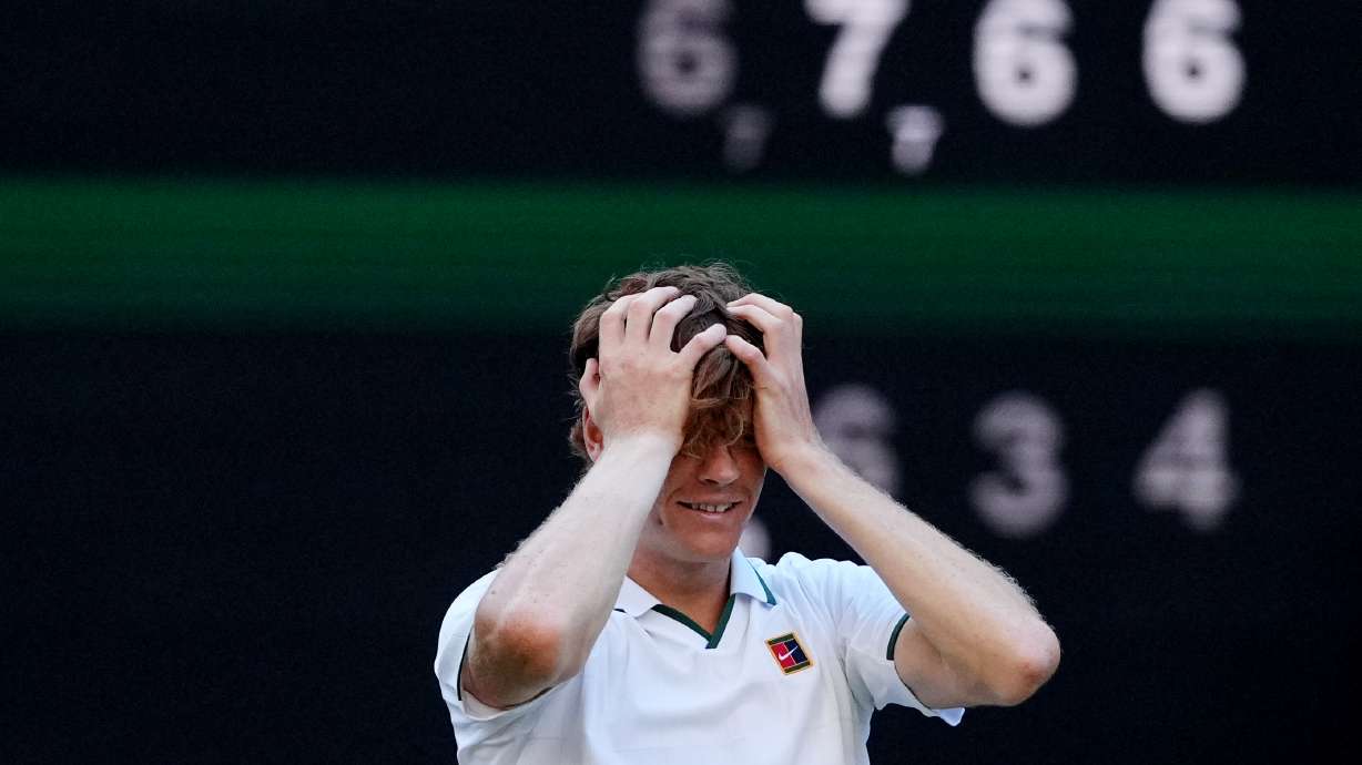 FILE - Jannik Sinner of Italy reacts after winning against Alexander Zverev of Germany in the men's singles final at Wimbledon Tennis Championships in London, Sunday, July 12, 2026.