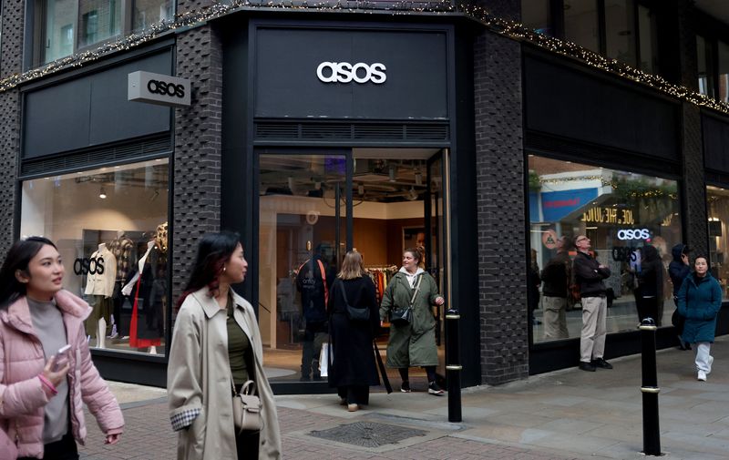 People walk past the ASOS pop-up store in London, Britain, November 12, 2025.