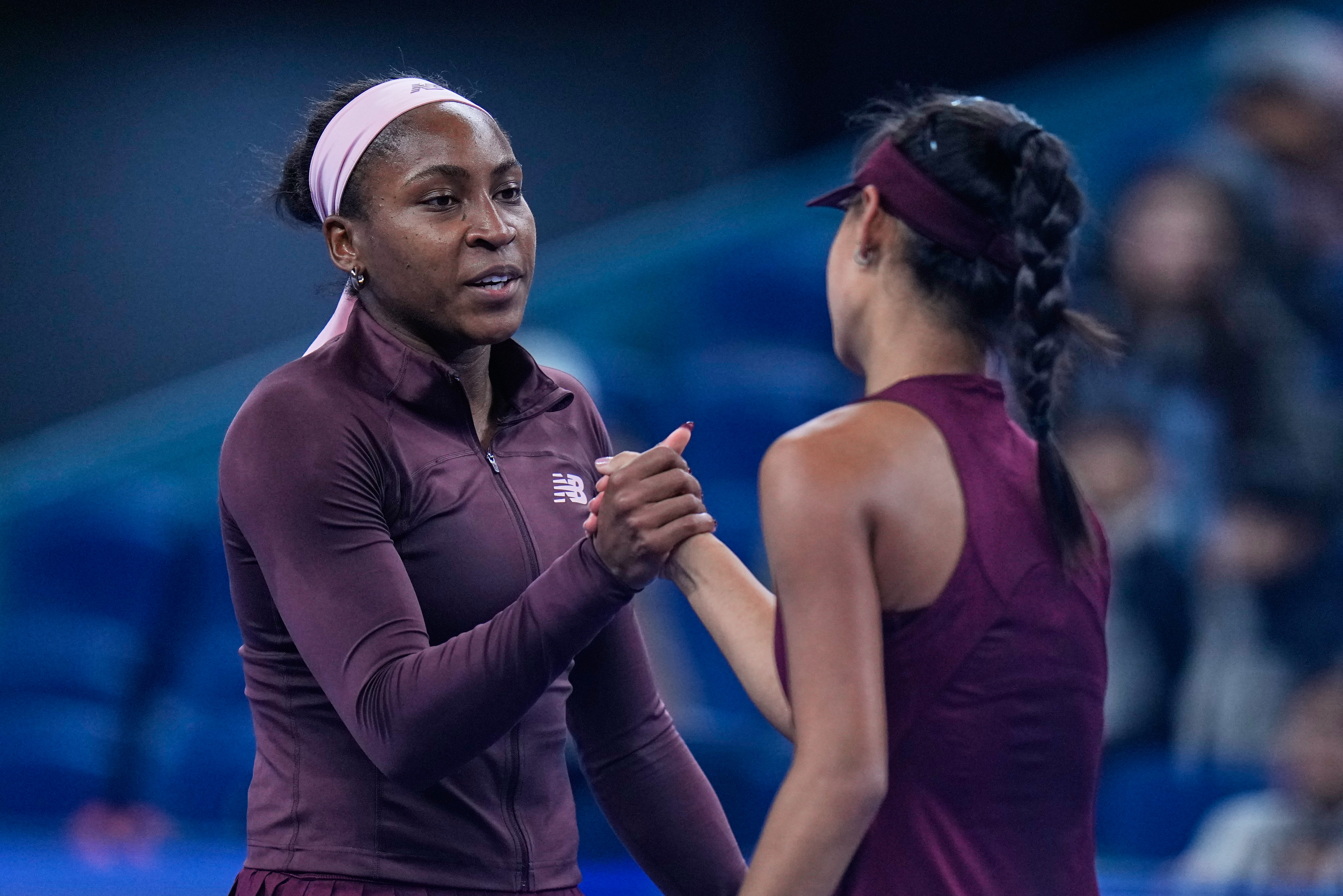 Coco Gauff of the United States, shake hands with Xinran Sun of China, after winning the third round of the women's singles match at the China Open tennis tournament in Beijing, Monday, Oct. 5, 2026. 
