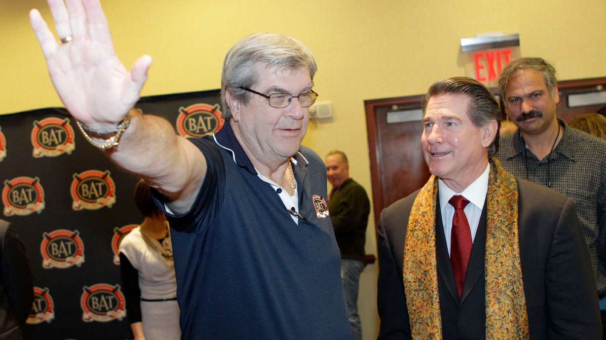 FILE - Former Major League Baseball players Sam McDowell, left, gestures while joking with Steve Garvey, right, before the 22nd Annual Baseball Assistance Team Dinner Tuesday, Jan. 25, 2011 in New York.