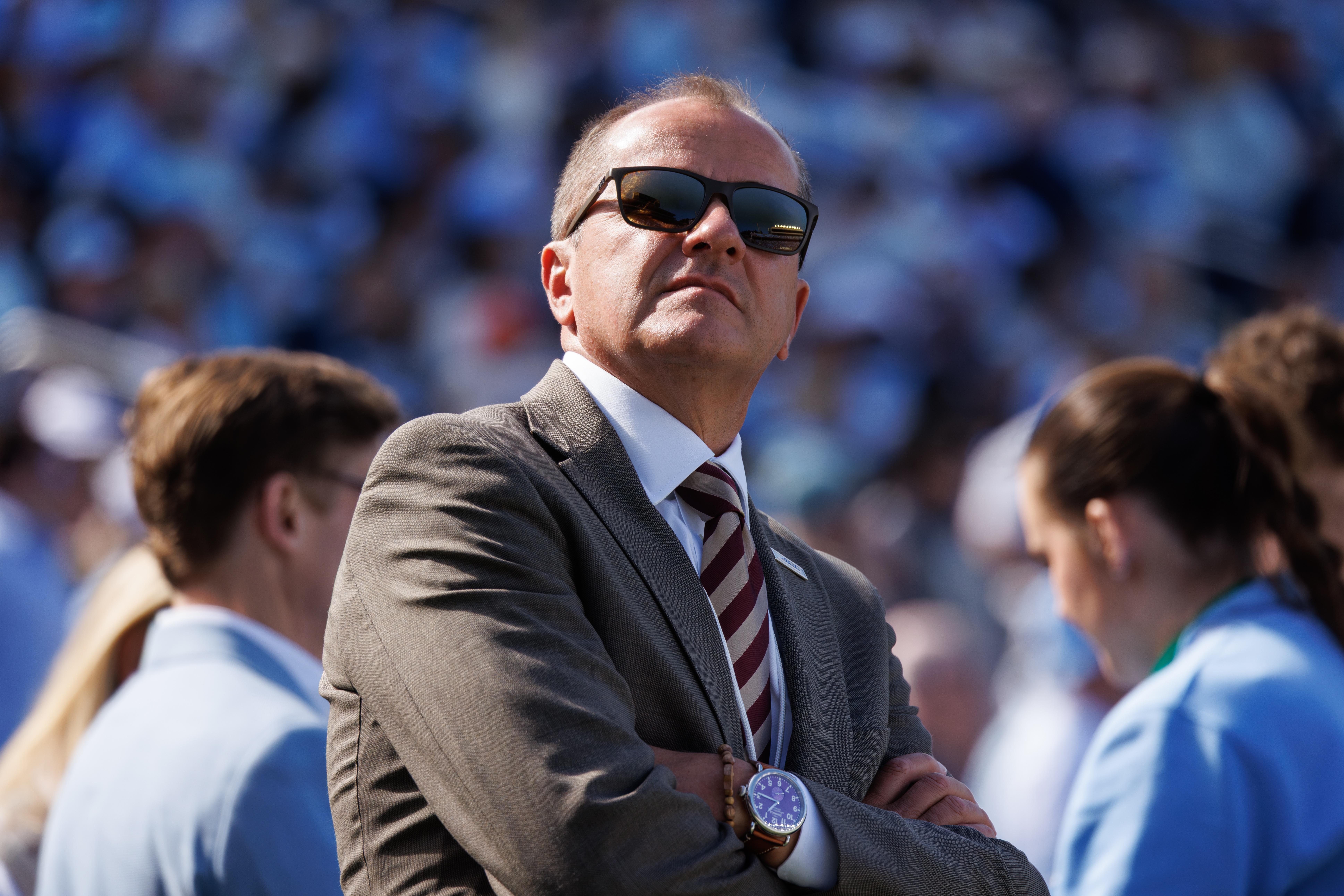 FILE - ACC Commissioner Jim Phillips walks the sideline during an NCAA college football game between North Carolina and Virginia in Chapel Hill, N.C., Oct. 25, 2025. 