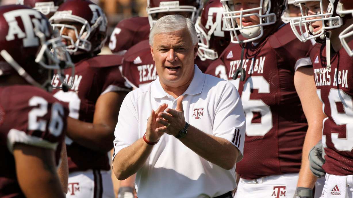 FILE - Texas A&M head coach Dennis Franchione watches his team warm up before their college football game against Baylor Saturday, Sept. 29, 2007 in College Station, Texas.