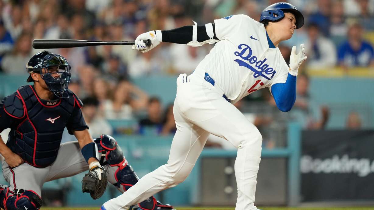 Los Angeles Dodgers two-way player Shohei Ohtani strikes out while batting during the seventh inning of Game 2 of a National League Division Series baseball game against the Atlanta Braves Sunday, Oct. 4, 2026, in Los Angeles.