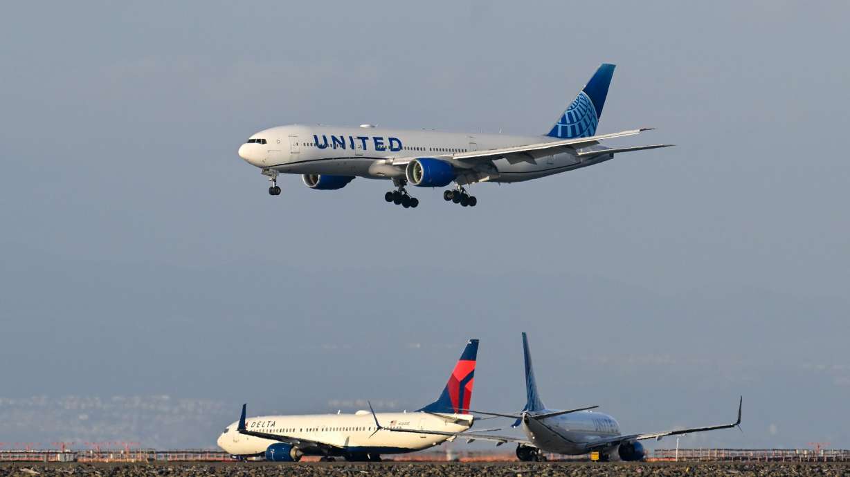 Delta and United Airlines planes are seen at San Francisco International Airport in this file photo taken on May 12, 2026. United Airlines and Delta Air Lines are recovering after experiencing a technology issue on Monday that caused problems for travelers around the world.