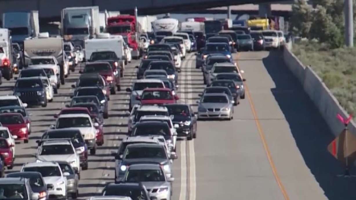 File photo shows vehicles traveling on I-15 in Utah.