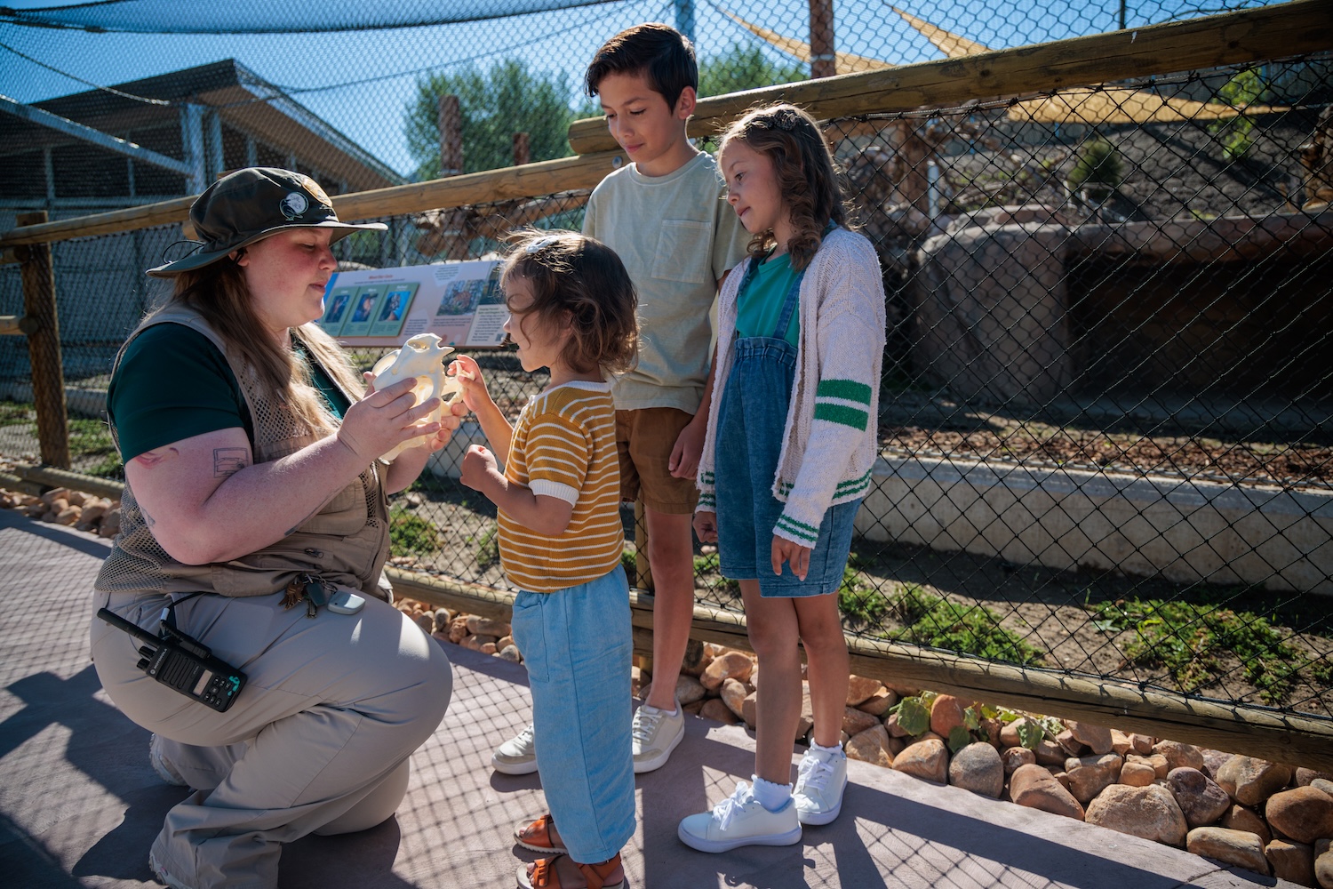A Hogle Zoo animal educator discusses cougars with children in the Aline W. Skaggs Wild Utah exhibit at Utah's Hogle Zoo in Salt Lake City.